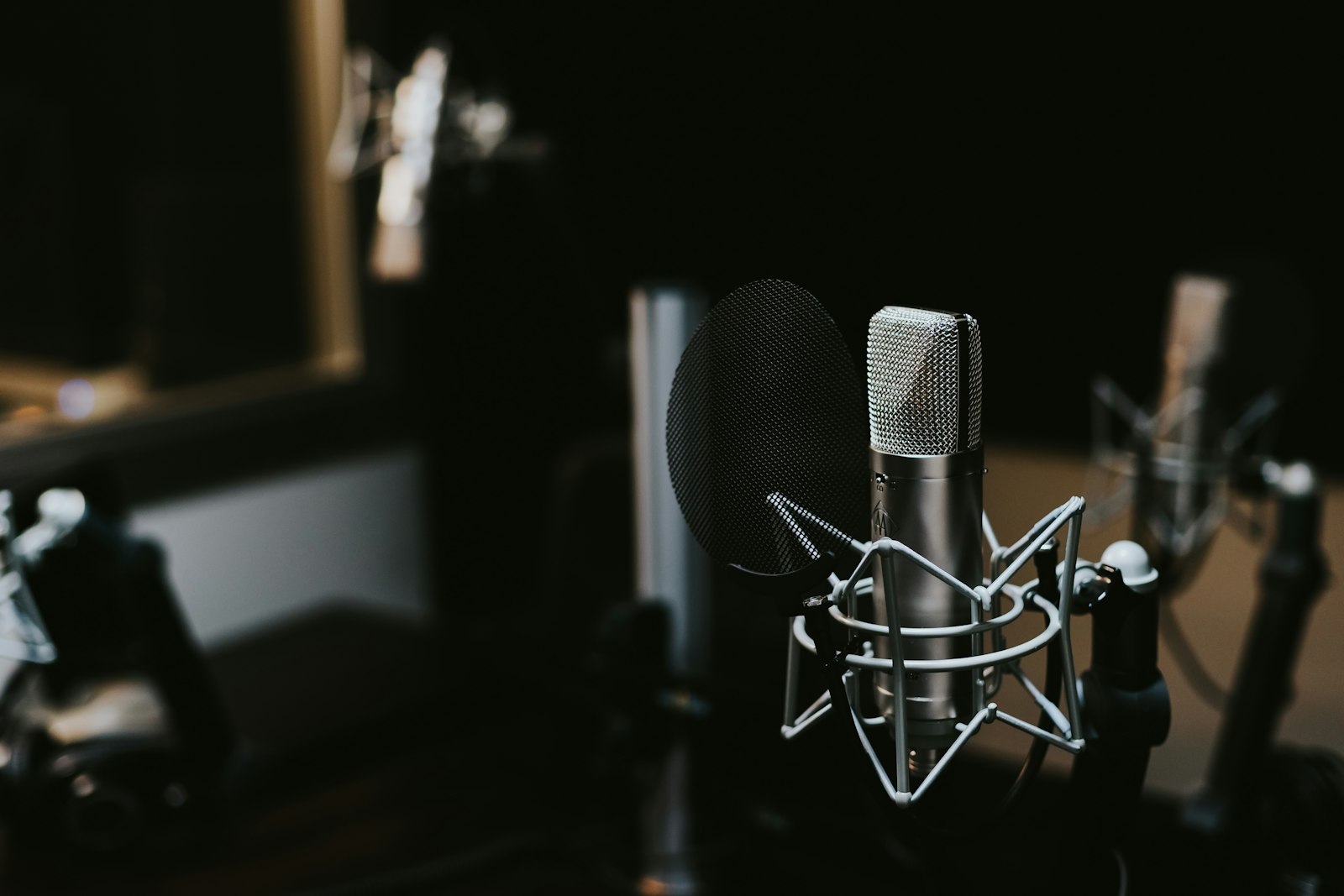 A studio microphone on a desk
